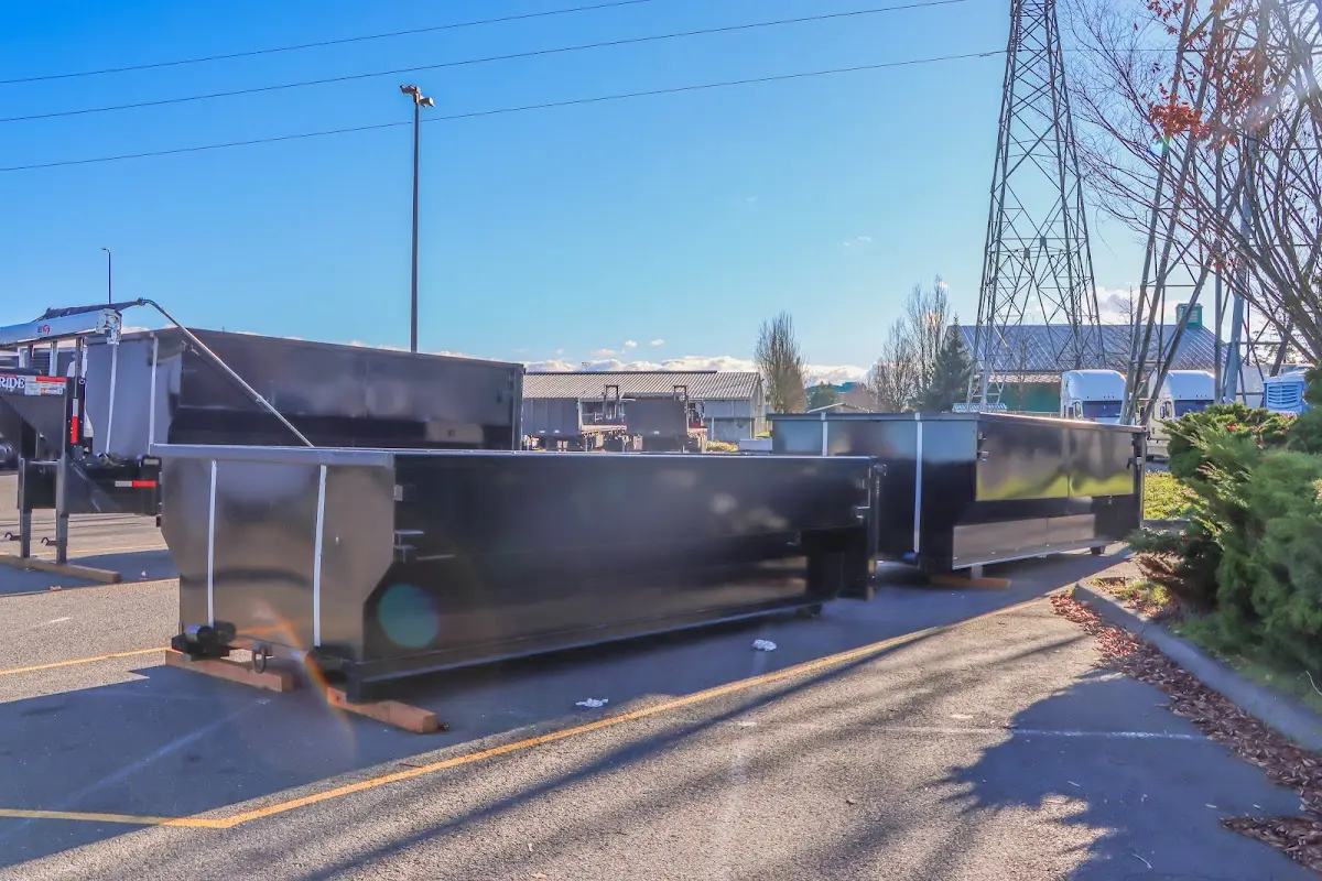 Roll-off dumpster ready for waste disposal at job site for 2 Yard Dumpster Rental in Rockford